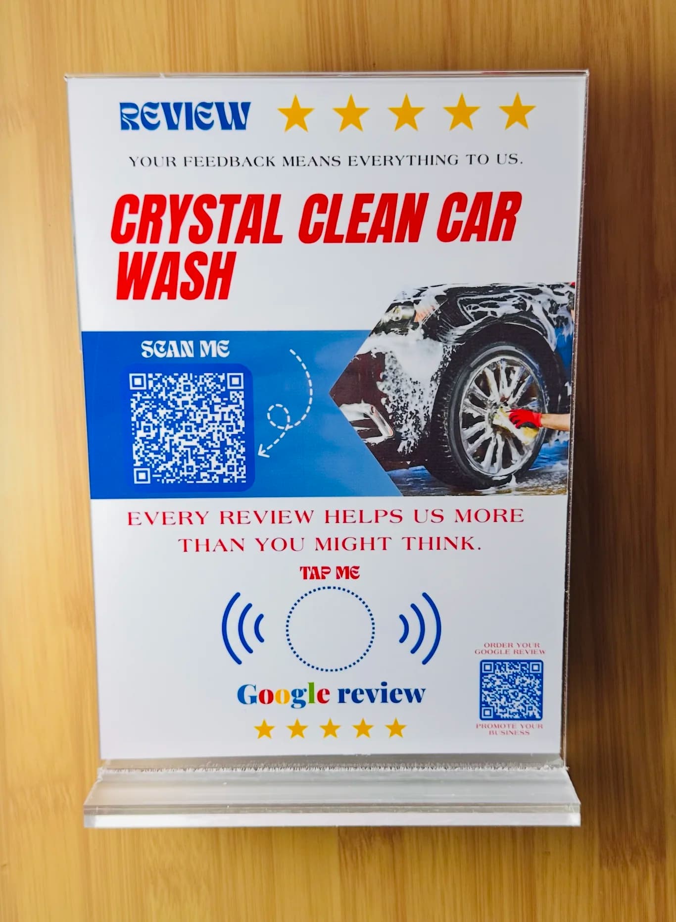 Acrylic counter stand holding the branded A5 review card